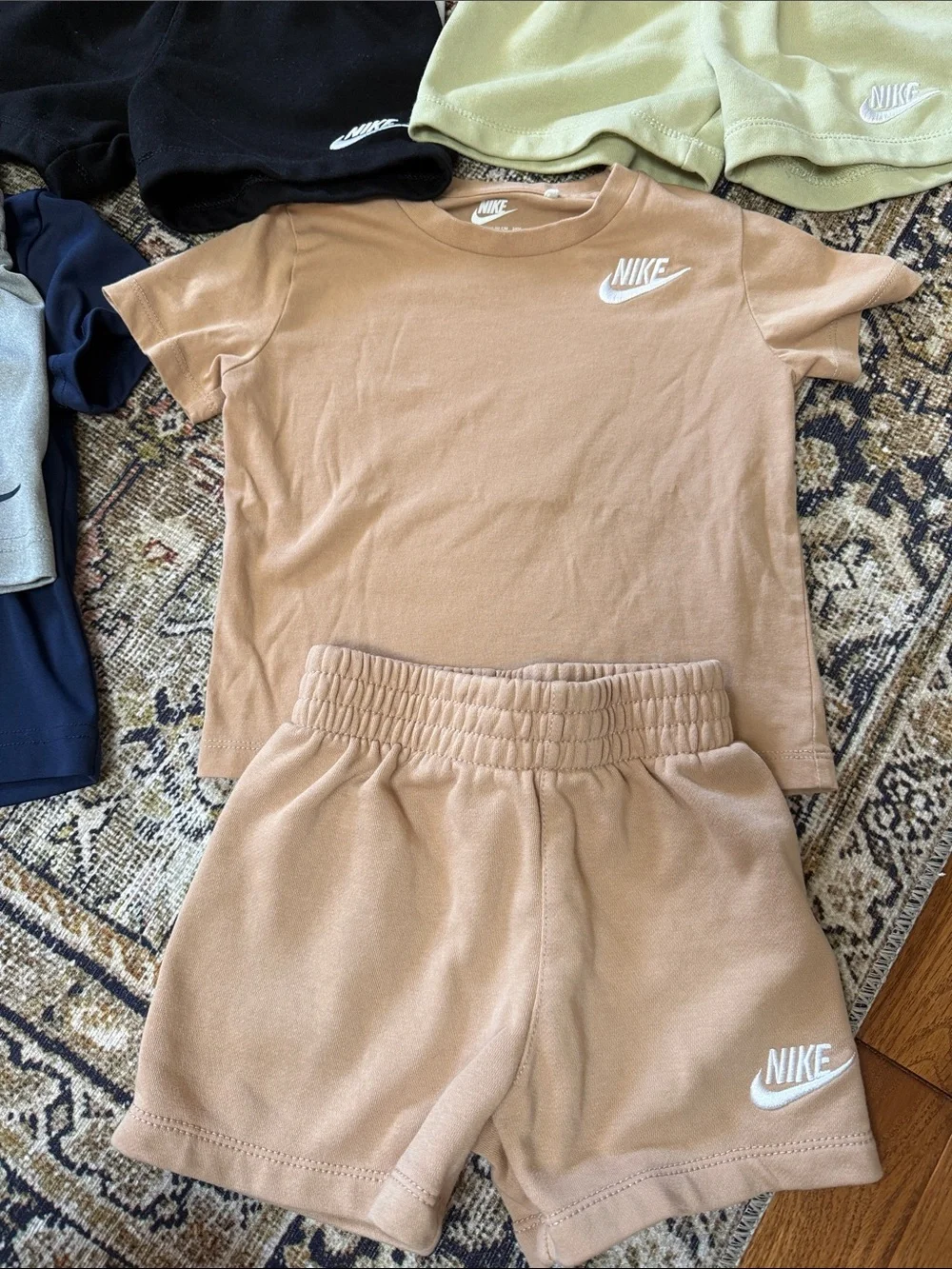 Four 2 pc Nike sets
